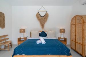 Letto o letti in una camera di CASA BIARI : Tropical Vibes - 3 min from beach