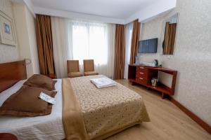 Postel nebo postele na pokoji v ubytování Side Star Beach Hotel - Ultra All Inclusive + 31 fotografií