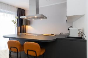 A cozinha ou cozinha compacta de The Doorman Goethe Frankfurt am Main