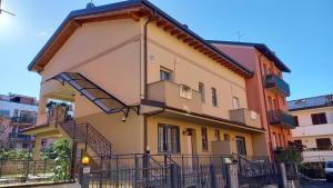 a building with stairs on the side of it at Home Sweet Home in Pessano con Bornago