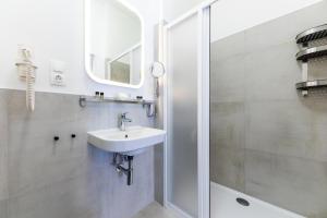 Kúpeľňa v ubytovaní Adagio Downtown Rooms + 37 fotografií