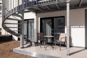 Uma varanda ou terraço em The Doorman Goethe Frankfurt am Main