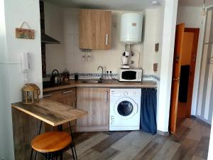Kuchyň nebo kuchyňský kout v ubytování Arabia´s Loft Nuevo Portil