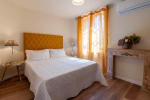 Voodi või voodid majutusasutuse Gian Paul Hotel toas