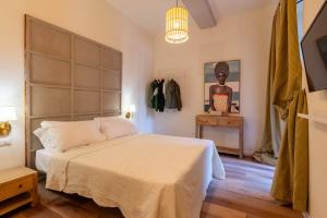 Voodi või voodid majutusasutuse Gian Paul Hotel toas