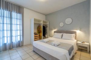 Postel nebo postele na pokoji v ubytování Aperitton Hotel