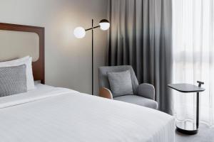 Katil atau katil-katil dalam bilik di Courtyard by Marriott Basel