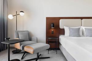 Katil atau katil-katil dalam bilik di Courtyard by Marriott Basel