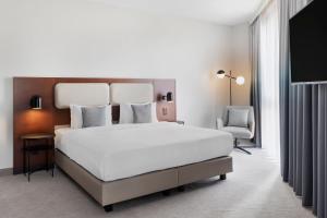 Katil atau katil-katil dalam bilik di Courtyard by Marriott Basel