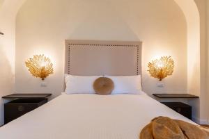 Voodi või voodid majutusasutuse Gian Paul Hotel toas