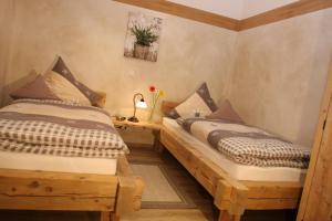 Кровать или кровати в номере Apartment Sammerhof