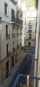 a view from a window of an apartment building at Pensión Iturriza in Donostia-San Sebastián