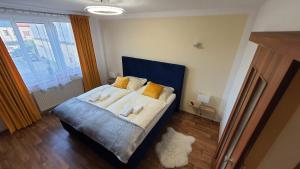 Postel nebo postele na pokoji v ubytování Apartmán U Pošty Králíky