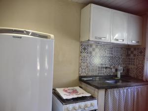 Dapur atau dapur kecil di Pousada do Trevo