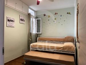 a bedroom with two beds in a room at CASA ROSSELLA in Torre Lapillo