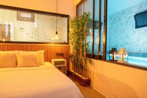 Katil atau katil-katil dalam bilik di Villa Oxy Private Pools & Seaview & Heated Indoor Pool