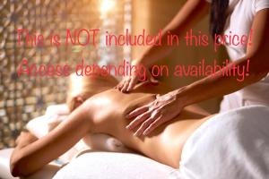 a woman getting a massage in a bed at Charming family condo in Silver Mountain in Poiana Brasov