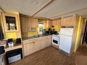 Kuchyň nebo kuchyňský kout v ubytování Beach Resort Kamperland - 164