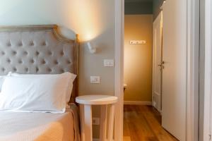 Voodi või voodid majutusasutuse Gian Paul Hotel toas