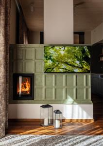 A television and/or entertainment centre at Hafnerhotel - Das Kachelofen-Wohlfühlhotel