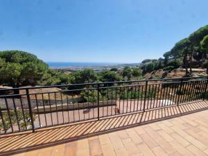 a balcony with a view of the ocean at Villa Maresme & Villa Rosa in Mataró