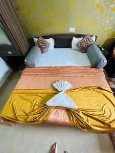 Hotel Siddarth Palace客房内的一张或多张床位