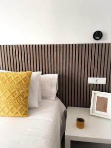 Cama ou camas em um quarto em H&H Suite El Mirlo