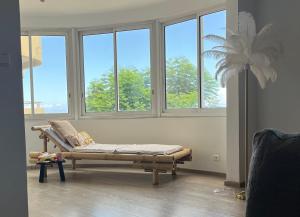 Posezení v ubytování Aprile des îles .Appartement avec une jolie vue