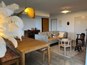 Posezení v ubytování Aprile des îles .Appartement avec une jolie vue