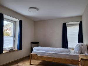 Postel nebo postele na pokoji v ubytování Kapitel 7 Boutique-Hotel