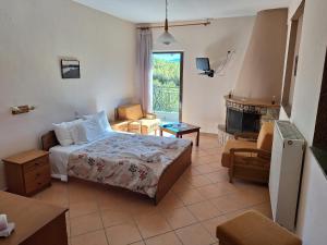 Postel nebo postele na pokoji v ubytování Miaritis rooms