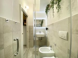 a bathroom with a toilet and a sink at Luxury me in Rome