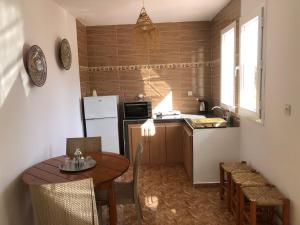 Kuchyň nebo kuchyňský kout v ubytování Camping la palmeraie Tifnit