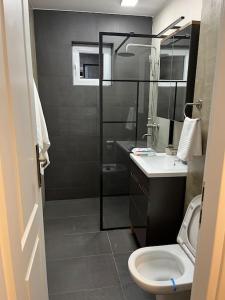 Et badeværelse på Apartament Suceava