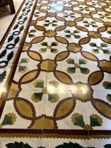 a tile floor with a design on it at Rabat Pied-a-terre in Rabat