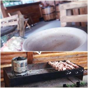two pictures of a grill with meat on a table at Cozy home in Zugdidi
