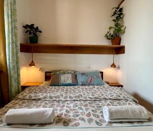 Rúm í herbergi á Bao Hostel Kutaisi