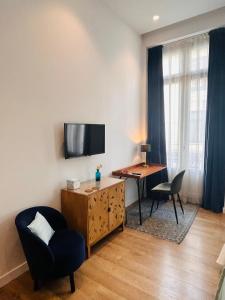 TV a/nebo společenská místnost v ubytování L'Esplai Valencia + 37 fotografií