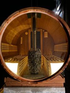 a stack of wine barrels in a circular oven at J and R flanders fields holiday homes in Diksmuide