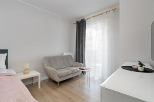 Posteľ alebo postele v izbe v ubytovaní Stylish & Comfy Garbary Apartments with Parking by Noclegi Renters