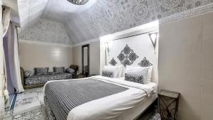 Postel nebo postele na pokoji v ubytování Riad Argan