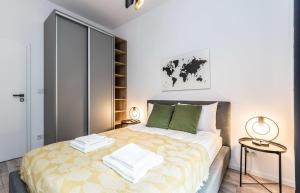 Posteľ alebo postele v izbe v ubytovaní Rent like home - Walońska 15