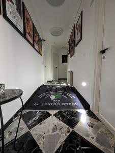 Postel nebo postele na pokoji v ubytování Al Teatro Greco