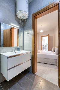 Voodi või voodid majutusasutuse A lovely 2BR home, in the centre of Marsaxlokk by 360 Estates toas