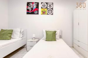 Voodi või voodid majutusasutuse A lovely 2BR home, in the centre of Marsaxlokk by 360 Estates toas