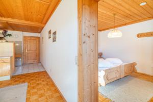 Łóżko lub łóżka w pokoju w obiekcie Appartements Spitzegel