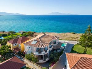 an aerial view of a house with the ocean at Kondarini Villa - Stunning Sea Views, 290m from the beach, by ZanteWize in Tsilivi