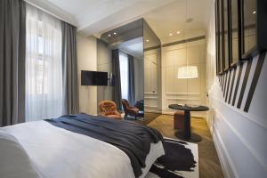 Posteľ alebo postele v izbe v ubytovaní Adriatic Hotel by Maistra Collection