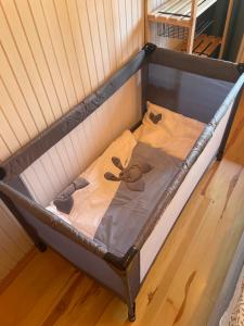 Postel nebo postele na pokoji v ubytování Apartmán s krbom vedľa Zubačky