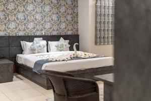 Voodi või voodid majutusasutuse Vesta Avtar Resort Pushkar toas